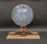 Cut glass hollow globe on wood stand, 59cm high