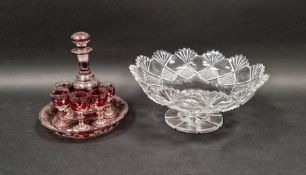 Continental ruby flashed spirit decanter and five glasses, on stand, decorated with fruiting vine