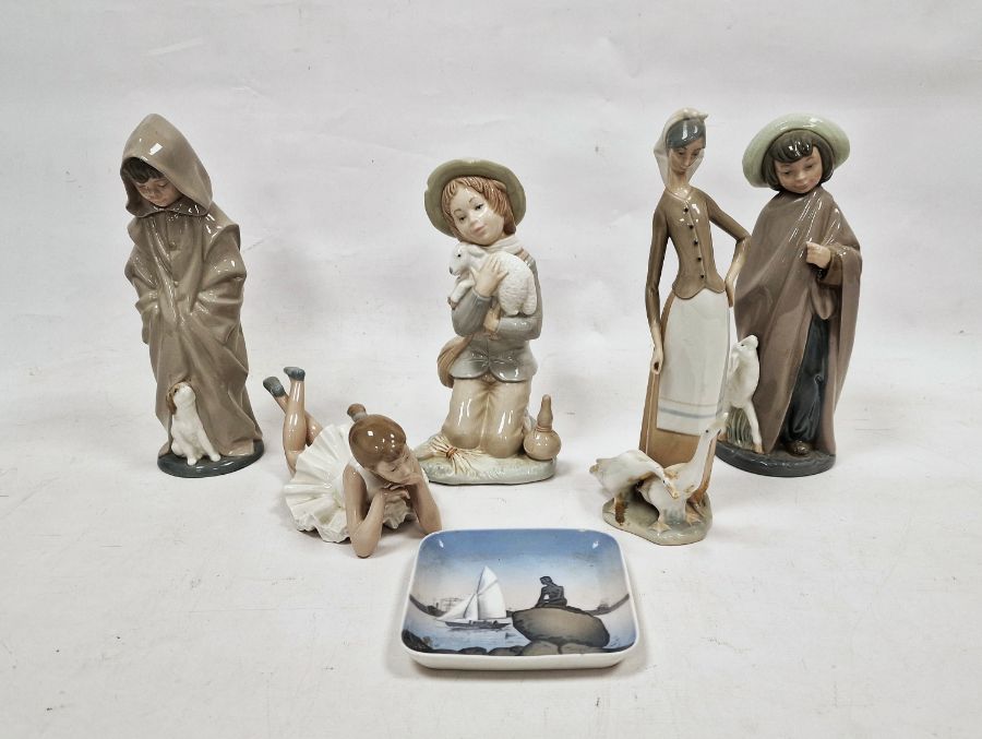 Lladro porcelain group of a goose girl with geese, three Nao figures, another figure and a Royal
