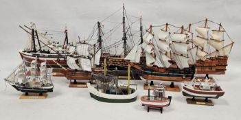 Nine various wooden model ships to include three-mast galleon, trawler and HMS Endeavour (9)