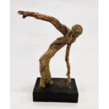 Margaret Bailokoz Smith driftwood sculpture figure with papier-mâché of twisting moving figure, on