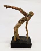 Margaret Bailokoz Smith driftwood sculpture figure with papier-mâché of twisting moving figure, on
