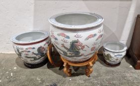 Three modern Chinese porcelain jardinieres or fish bowls, printed and painted with scrolling