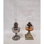 Painted iron and glass oil lamp and another in chrome metal (2)