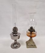 Painted iron and glass oil lamp and another in chrome metal (2)
