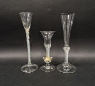 Three opaque airtwist drinking glasses comprising a cordial glass with tapering conical bowl above