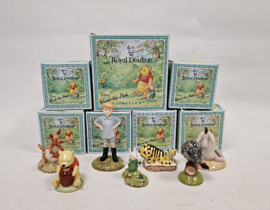 Seven Royal Doulton 'Winnie the Pooh' figures to include Christopher Robin, Tigger, Winnie the Pooh,