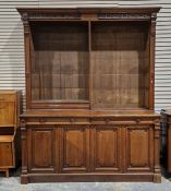 Large late 19th/early 20th century oak library bookcase with eight adjustable shelves, raised over