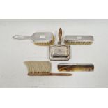 Silver mounted dressing table set, comprising hairbrush, clothes brush and a hair comb, hallmarked