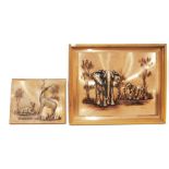 Copper plaque with mounted resin models of elephants and another copper plaque with mounted resin