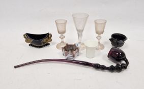 Three 18th century continental soda drinking glasses on baluster stems and folding feet (