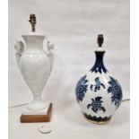 Hutschenreuther porcelain table lamp of bulbous form and with blue and gilt floral sprays, 42cm high