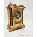 Moulded brass mantel clock of rectangular form with Gothic revival decoration, the dial with