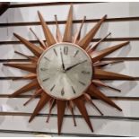 Mid century Metamec starburst wall clock, the silvered dial having baton hour markers with quarterly