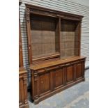 Large late 19th/early 20th century oak library bookcase with eight adjustable shelves, raised over