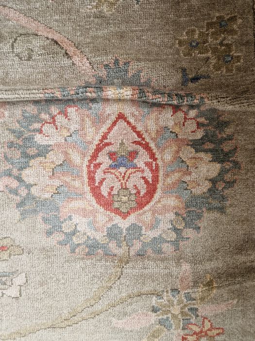 Very large pale green ground Turkish wool rug with central floral medallion on floral interlocked - Image 24 of 41
