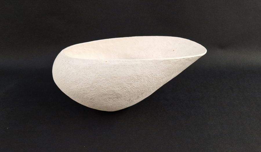 Betty Blandino (1927-2011) Hand built white stoneware vessel of asymmetrical form with textured