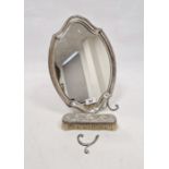 George V silver mounted mirror, of stylised shield form, hallmarked London 1912 by William Comyns,