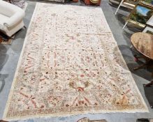 Large cream ground carpet with interwoven floral field, multiple floral borders 490cm x 330cm