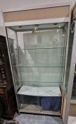 Large glazed display cabinet having three adjustable glass shelves and two glass sliding doors to