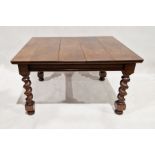 Oak extending dining table, rectangular, on heavy spirally twisted supports and bun feet, 107cm x