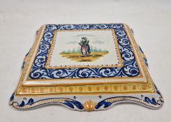 Quimper pottery cake stand, square and decorated with female figure, 31cm Condition ReportLight