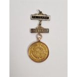 9ct gold Great Western Railways 15 years first aid efficiency medal on suspender, with two metal