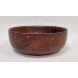 Carved wooden fruitbowl of circular form, 30cm diameter approx.