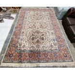 Modern cream ground carpet with central floral medallion on floral field, multiple floral borders