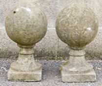 Pair of stone ball finials, 41cm high (2)