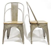 Pair of Oak Furniture Land 'Brooklyn' metal and wooden seated dining chairs (2)