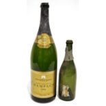 Empty Fortnum & Mason champange jeroboam bottle dated 1989 and one further empty champagne bottle (