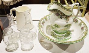 Copeland Spode wash bowl and jug with floral and landscape decoration, two glass decanters and two