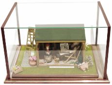 Diorama featuring an old man reading a newspaper in his potting shed, housed in a glass case