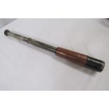 Leather cased three draw telescope made by Dollond, London. Leather cased Dr Wohler Saar