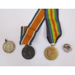 WWI war and victory medals named to '254921, SPR. FJ Knowles RE'. Locket with photographs of a