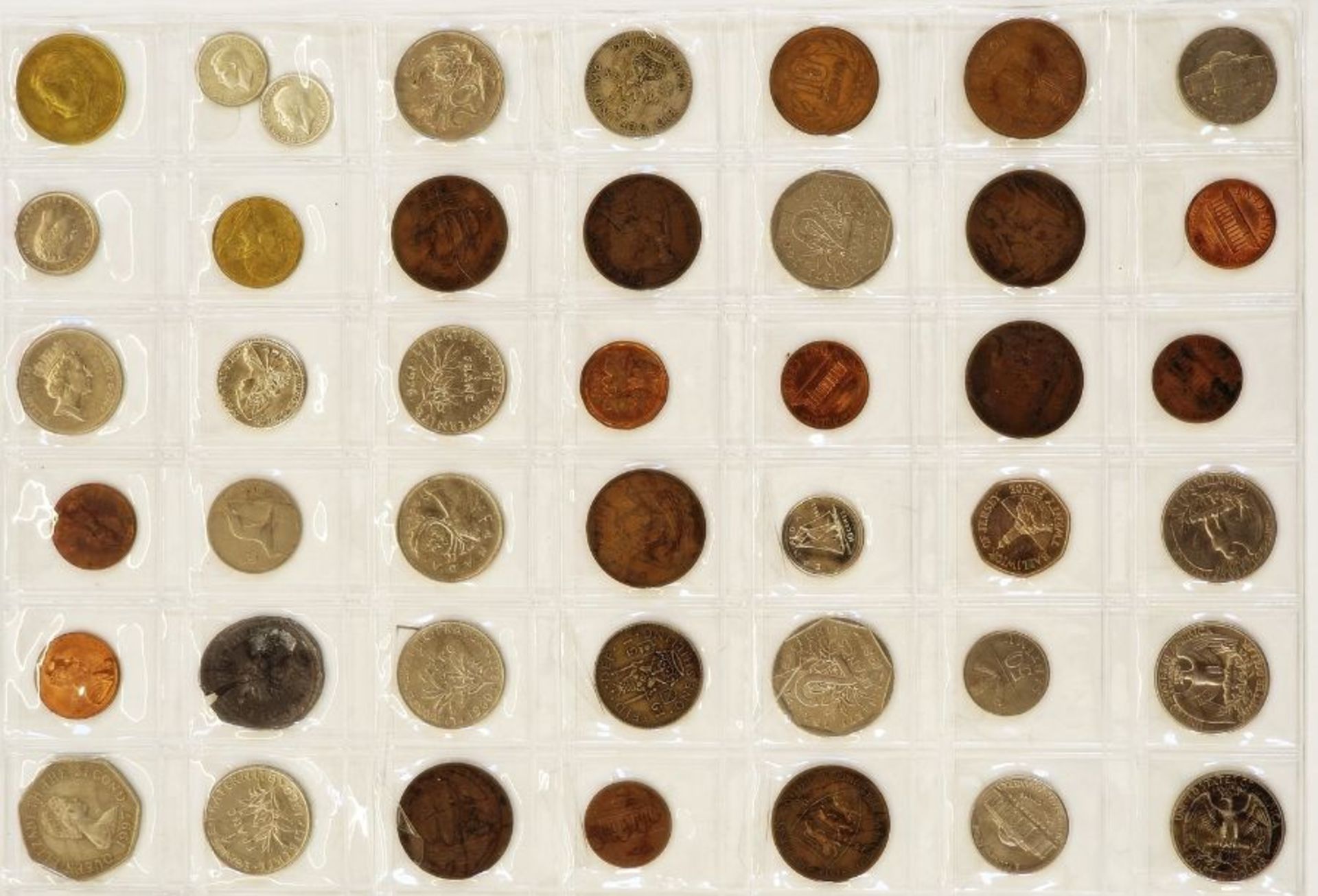 A large collection of English and World Coins contained within 17 sheets, some English silver, - Image 6 of 19