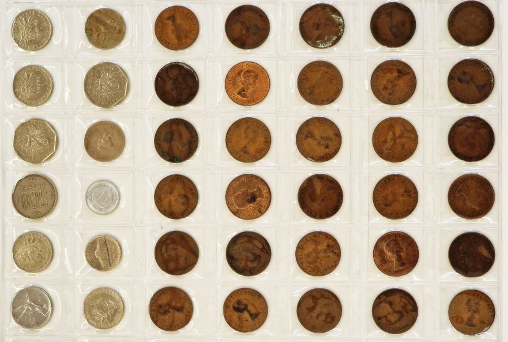 A large collection of English and World Coins contained within 17 sheets, some English silver, - Image 15 of 19