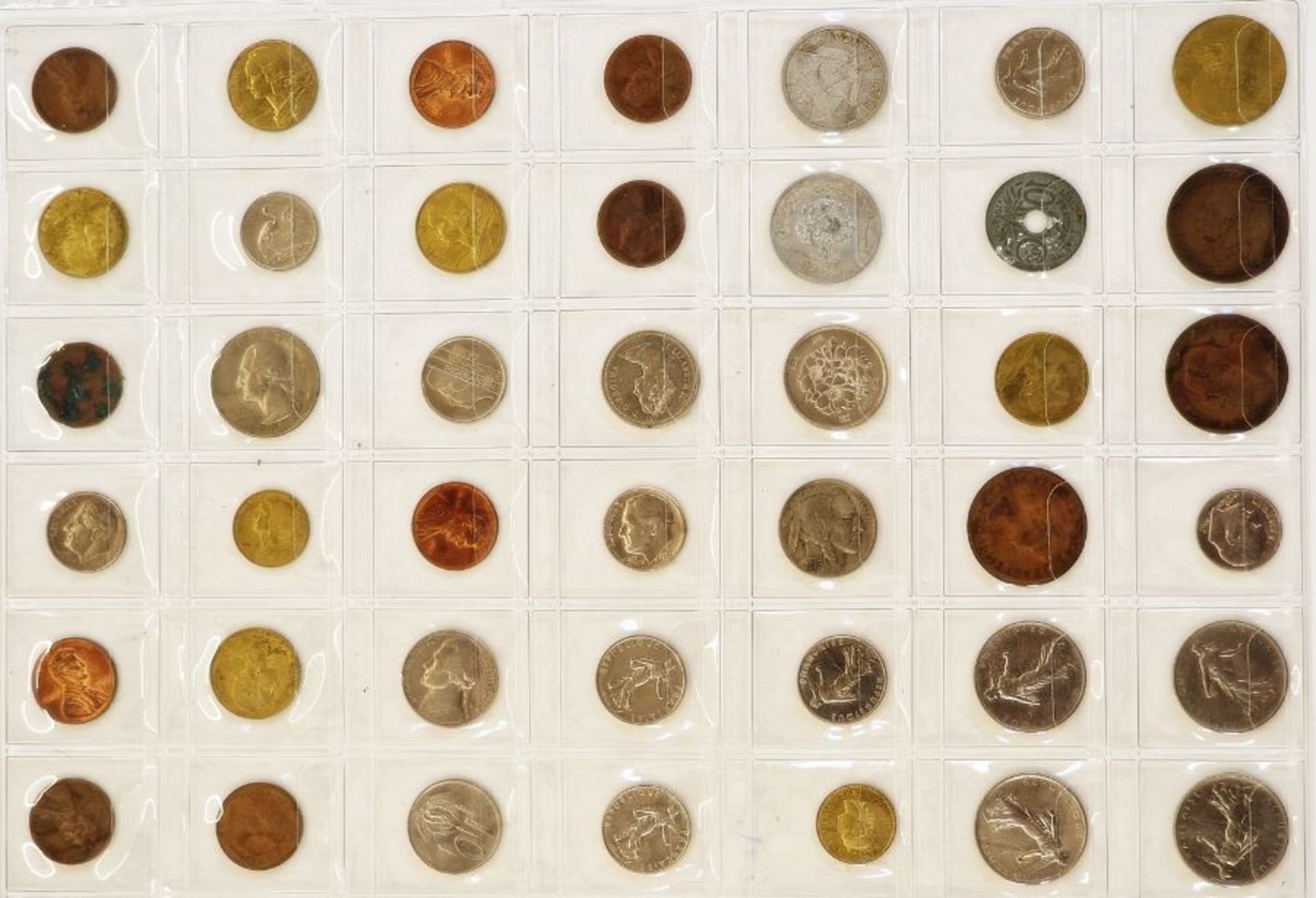 A large collection of English and World Coins contained within 17 sheets, some English silver, - Image 11 of 19