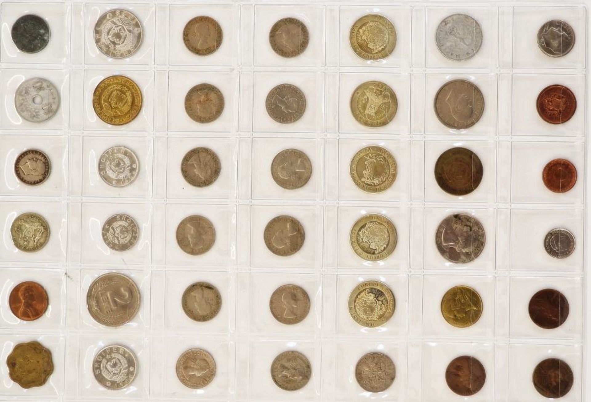 A large collection of English and World Coins contained within 17 sheets, some English silver, - Image 8 of 19