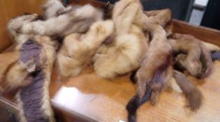 Quantity of linen and some fox fur stoles