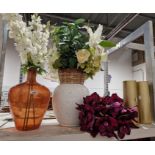 Assortment of vases and fake flowers