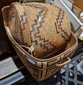 Two wicker baskets with coloured wicker geometric shape patterns and a rug (3)