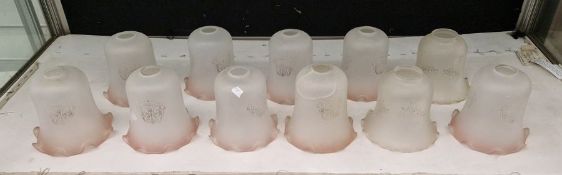 11 acid-etched frosted glass oil lampshades, adapted for electric wall lights , nine with