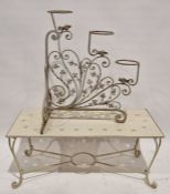 Vintage garden wirework plant holder and a modern metal garden table with pierced floral