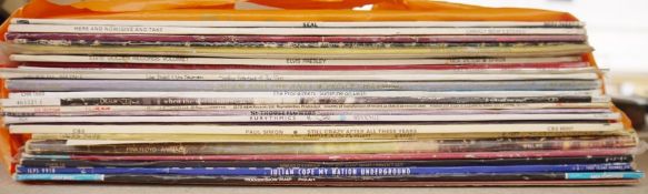 Assorted vinyl LPs from the 1970's and 80's including Bob Marley and the Wailers, Exodus, Sinead O'