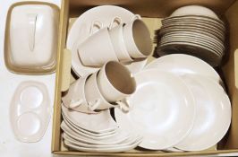 Quantity of Poole twin-tone pottery in brown and cream colourway to include cups, bowls, side