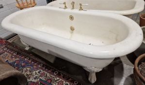 Vintage cast iron roll-top bath, 190 cms in length, with brass taps, by George Jennings Limited,