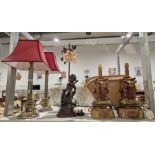 Pair of table lamps with carved elephant decoration, a pair of metal columned table lamps and one