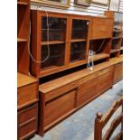 A mid century teak sideboard, measuring approx. 150cm high x 196cm wide x 48cm deep.